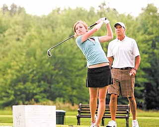 ROBERT K. YOSAY | THE VINDICATOR..Jr Golf tournament at Avon - Kelly Fleming  with her instructor Joe Allen -  ( she is in greenish blue top) black shorts.. later she is with Sophia  Pilolli.. both of Canfield - ...-30-