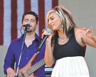 Country musician and Boardman native Sarah Turner performs at the Judge Morley Pavilion Wednesday night as the opening act for the season of the 7-Up Summerfest Spectacular 2011.
