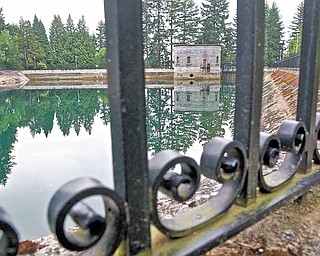 This spot at the Mt Tabor number 1 reservoir Monday June 20, 2011, is where a 21-year-old man was seen on surveillance video urinating into the reservoir in Portland, Ore. City officials have decided to drain the reservoir at the cost of about $36,000 because of the incident. (AP Photo/Benjamin Brink/The Oregonian)