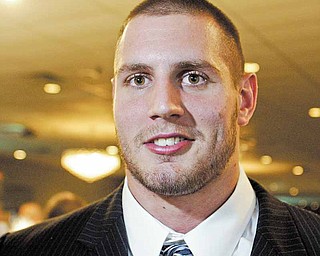 Ohio State junior lineman and Cardinal Mooney High School graduate John Simon during the United Way’s “Champions Among Us” annual banquet Thursday at Mr. Anthony’s in Boardman. He was honored by organizers as local champions who have represented the Mahoning Valley in a positive manner.