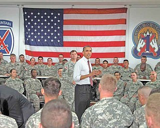 President Barack Obama speaks to soldiers from the 10th Mountain Division, many of whom have just returned from Afghanistan, Thursday, June 23, 2011, in Fort Drum, N.Y. (AP Photo/Carolyn Kaster)