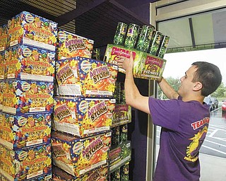 William D Lewis The Vindicator Phantom Fireworks employee Mason Fowler stocks shelves at new Phantom location on Meridian Rd.