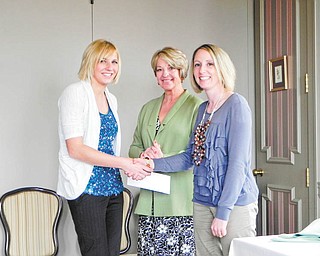 Lions Club scholarship: The Youngstown Lions Club recently presented a scholarship to Leetonia High School graduate Tabatha Turney, above left, who will attend Youngstown State University. The award is in memory of Rita Merz, who was an outstanding member of the Lions. The club also presents two other annual scholarships to students attending YSU. Included in the photo are Merz’s sister, Rita, and Heather Belgin, president of Youngstown Lions Club.