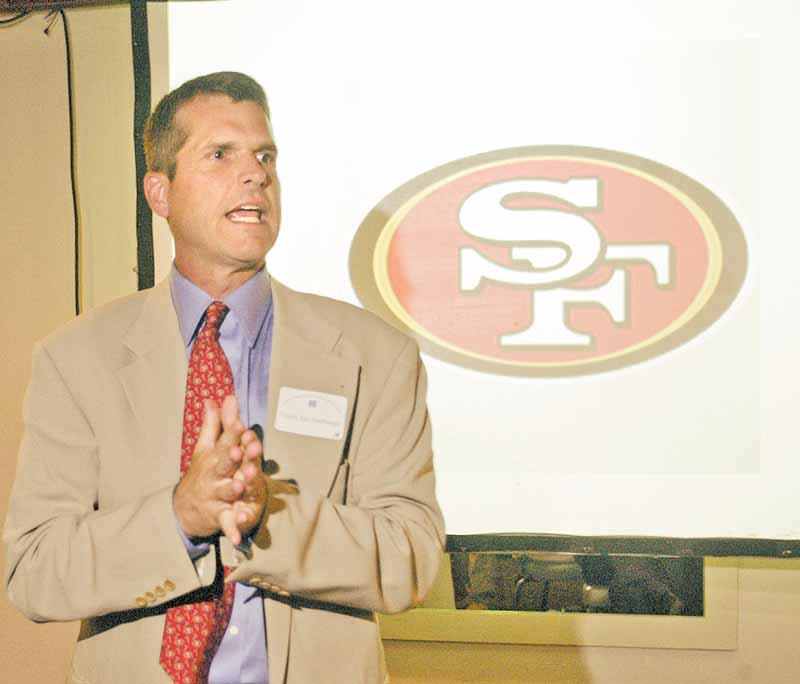 Jim Harbaugh, the new head coach of the San Francisco 49ers, was among the guests at the annual
Edward J. DeBartolo Memorial Scholarship Foundation celebrity dinner auction in Howland.