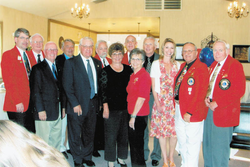 Canfield Lions Club has installed new officers. Those participating were, from left to right, front row, John Africa, Phil Bova, Joan Filisky, Caroline Phillips, Dr. Carmela Abraham, Harry Pancher and Ted Filmer, and back row, Dave Gauch, district governor-elect, installing officer; Tom Zurawick; Don Kwolek; Rich Yager; Pete Cannell; and Jack Patrick. Board members not pictured are Chris Haus, Jim Duncan and Marilyn Schmidt.