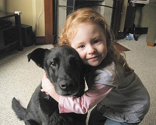 Kimberly and Gary McAfoose of McDonald have owned Chloe for the past 10 years. Gary found her in the parking lot where he works when she was just a few months old. She became their youngest daughter, Kira's, best buddy.