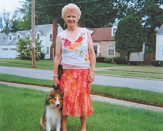 Ruth Cramer of Youngstown adopted Murphy in January. The mahogany Sheltie is 1 year old.