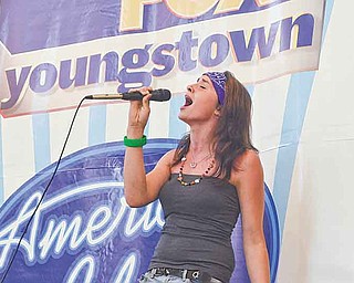 Kerstin Williams, 16, of Warren performs “Call Me When You’re Sober” by Evanescence at Eastwood Mall. About 100 performed to gain a spot at the “American Idol” Pittsburgh competition.