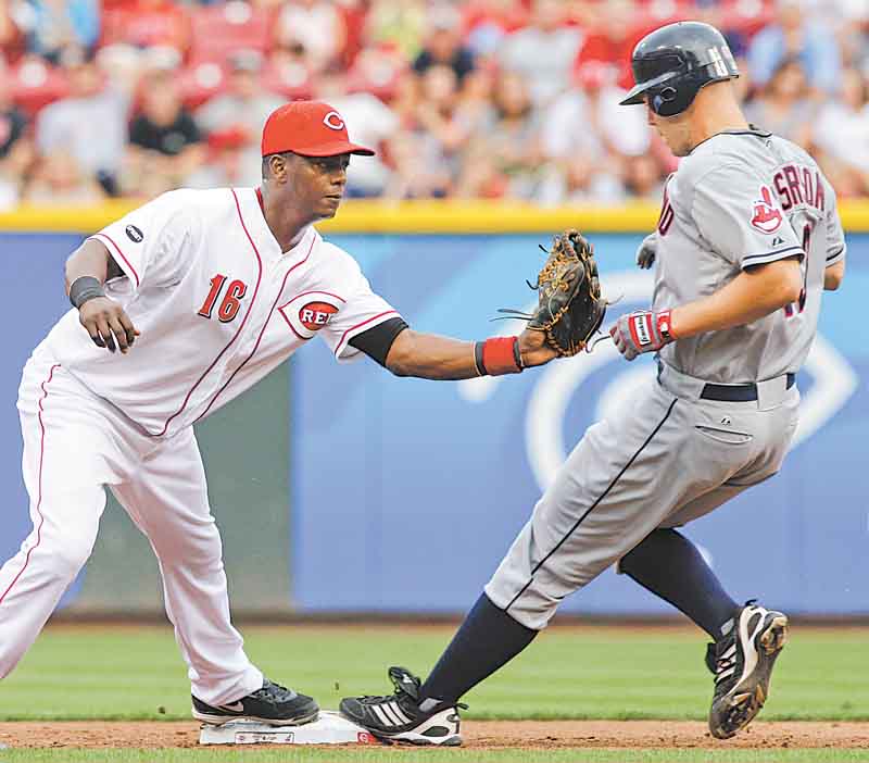 Cincinnati Reds shortstop Edgar Renteria (16) makes the out on Cleveland Indians' Justin Masterson at second base in the third inning of an interleague baseball game on Friday, July 1, 2011, in Cincinnati. Masterson was out on a fielder's choice hit into by Michael Brantley. (AP Photo/Al Behrman)