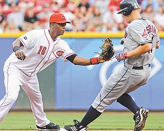 Cincinnati Reds shortstop Edgar Renteria (16) makes the out on Cleveland Indians' Justin Masterson at second base in the third inning of an interleague baseball game on Friday, July 1, 2011, in Cincinnati. Masterson was out on a fielder's choice hit into by Michael Brantley. (AP Photo/Al Behrman)