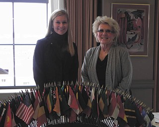 Dr. Cynthia Anderson, right, president of Youngstown State University, spoke at a Youngstown Lions Club meeting recently at the Youngstown Club. Dr. Anderson said YSU’s biggest challenge is coping with continual cuts in state funding. She also expressed excitement about the many improvements at YSU, including the new Williamson School of Business and the indoor sports facility. At the same meeting, Jen Preisse, at left, was inducted into the club.