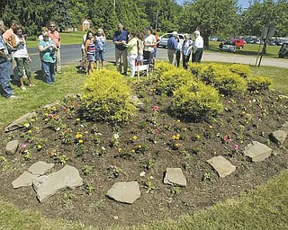 Several people showed up to congratulate Anderson, now of Youngstown, at the garden named in her honor.