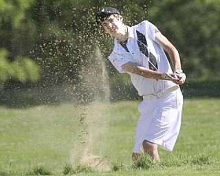 ROBERT K. YOSAY | THE VINDICATOR..Brandon Pluchinsky - works his way out of a trap on the number 10 hole at Diamond Back Golf Course - The areaÕs best youth golfers hit the links Tuesday, trying to make a name for themselves and collect the scholarship that comes along with the success.. the kickoff to the first ÒGreatest Junior Golfer in the ValleyÓ tournament, and the first ball will be launched off the tees of the Diamond Back Golf Course in Canfield. Throughout the month, golfers under the age of 18 as of Aug. 31 will attempt to qualify and be named the best...-30-