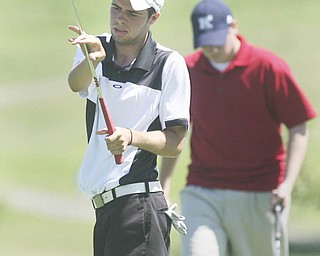 ROBERT K. YOSAY | THE VINDICATOR..Zach Eckert fineses his shot on 10- behind him is Joey Canann - The areaÕs best youth golfers hit the links Tuesday, trying to make a name for themselves and collect the scholarship that comes along with the success.. the kickoff to the first ÒGreatest Junior Golfer in the ValleyÓ tournament, and the first ball will be launched off the tees of the Diamond Back Golf Course in Canfield. Throughout the month, golfers under the age of 18 as of Aug. 31 will attempt to qualify and be named the best...-30-