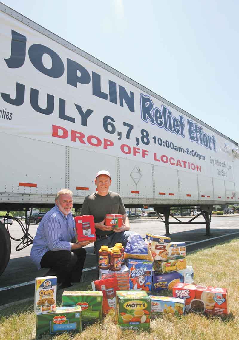 Bob Cole, left, and the Rev. Rusty Wills are coordinating Joplin Relief, a grassroots effort in the faith community to collect donations for victims of the devastating tornado in May in Joplin, Mo. Donations, like the ones shown, will be accepted today through Friday at three sites in the Mahoning Valley.