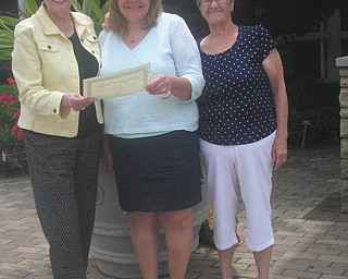 At its June flower show, the Garden Forum of Greater Youngstown presented Emily Conrad and Karen Fullerman each a $500 scholarship. From left are Patricia Feindt, scholarship chairman; Karen Fullerman; and Mary Shall, club president.