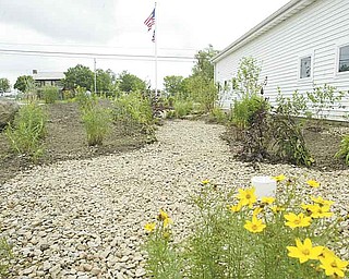 A new rain garden installed at the Mill Creek MetroParks Farm in Canfield was funded through a $10,850 surface-water improvement grant from the Ohio Environmental Protection Agency. MetroParks received the grant in May 2010.