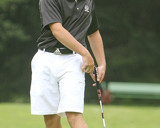 ROBERT K. YOSAY | THE VINDICATOR..Watching as his ball rims the hole on 16 is the tourney winner Dominic Patella - Cardinal Mooney - The Second Round of qualifiers for the Best Jr. Golfer was held at Tamer Win in Cortland on Friday morning - .. ...-30-