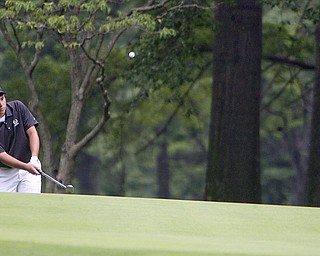 ROBERT K. YOSAY | THE VINDICATOR..winning chipper - Dominic Patella chips as Adam Bouch looks on.. - 16th hole - The Second Round of qualifiers for the Best Jr. Golfer was held at Tamer Win in Cortland on Friday morning - .. ...-30-