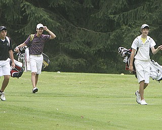 ROBERT K. YOSAY | THE VINDICATOR..The Second Round of qualifiers for the Best Jr. Golfer was held at Tamer Win in Cortland on Friday morning - Dominic Patella -Mooney --C J Bart - Howland - and Brandon Pluchinsky - South Range -walk up the fairway .. ...-30-