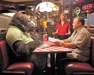 Kevin James, right, and Jackie Sandler star in Columbia Pictures' comedy "Zookeeper."