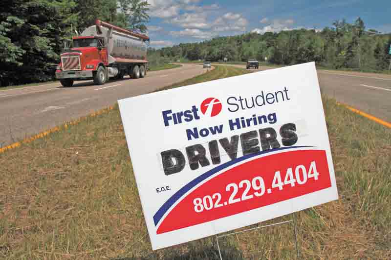 A sign looking to hire drivers, is placed on a roadway in Berlin, Vt. on Thursday, July 7, 2011. Unemployment rises to 9.2 pct. in June, employers add only 18,000 jobs. (AP Photo/Toby Talbot)
