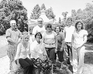 Committee members and Mill Creek MetroParks staff members gather after finalizing the details for Prairie Nights, the 20th annual summer Garden Party of Fellows Riverside Gardens in Mill Creek Park. From left to right are Dennis Penner, gardens supervisor; Margi Napoli, committee member; Sharon Letson, co-chair; David Armstrong, Dolly Vivalo and Deby Clark, committee members; Paul Hagman, co-chair; and Linda Kostka, development and marketing director of Mill Creek MetroParks.