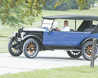 Joe Phillips, a member of the Mahoning Valley Old Car Club, drives his 1923 Essex during last year’s car show. Hunter Shaffer, a 4-year-old boy with refractory epilepsy, is the benefit recipient of this year’s show on Aug. 7.
