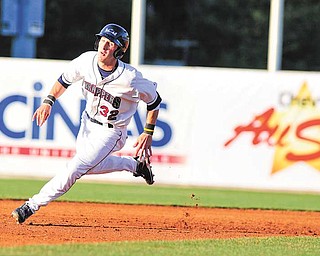 Evan Frazar of the Mahoning Valley Scrappers rounds second base on his way to third during a New York-Penn League game Wednesday against the Connecticut Tigers at Eastwood Field in Niles. Frazar, a 27th round draft pick by the Indians last month, played his first full game as a Scrapper, going 2 for 4 and scoring the game-winning run in the bottom of the ninth inning to lead Mahoning Valley to a 2-1 win over the Tigers.