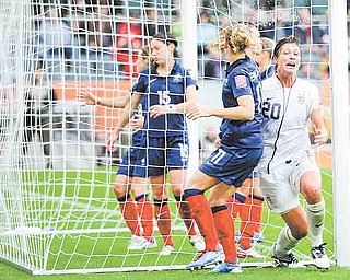 United States' Abby Wambach reacts after scoring her side's second goal during the semifinal match between France and the United States at the Women’s Soccer World Cup in Moenchengladbach, Germany, Wednesday, July 13, 2011. (AP Photo/Martin Meissner)