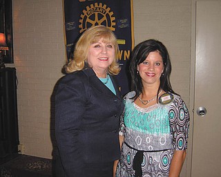 Walk to End Alzheimer’s: Helen Paes, left, community development director for the Greater East Ohio Area Chapter of the Alzheimer’s Association, spoke recently to the Rotary Club of Austintown, led by President Deanna Spirko, right. Paes discussed the Walk to End Alzheimer’s scheduled for Sept. 24 at Courthouse Square in Warren and Oct. 8 at Boardman Park. She said the purpose of the walk is to draw attention to the disease, the sixth leading cause of death in the United States. For more information on the walk or on healthy aging, visit www.alz.org or call 330-533-3300.