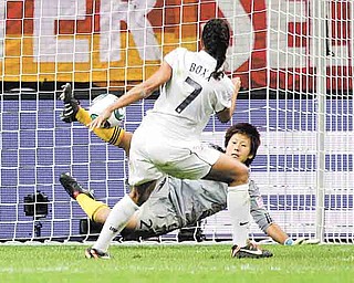Japan goalkeeper Ayumi Kaihori saves a shot from the spot by United States' Shannon Boxx during the penalty shootout of the final match between Japan and the United States at the Women’s Soccer World Cup in Frankfurt, Germany, Sunday, July 17, 2011.  The Japanese women's soccer team won their first World Cup Sunday after defeating USA in a penalty shoot-out.(AP Photo/Marcio Jose Sanchez)