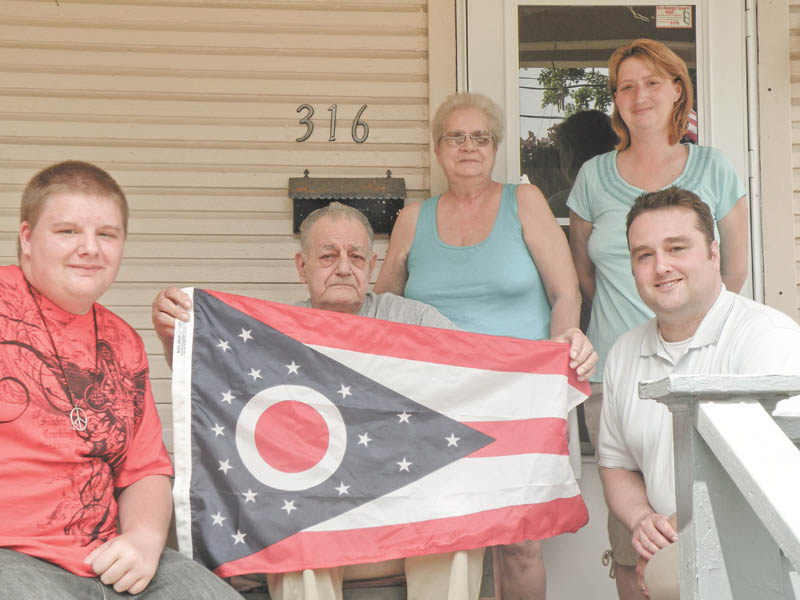Not forgotten: During the Fourth of July weekend, Columbiana County Recorder Craig Brown met with local war veteran Jonas Murray. Murray is one of the area’s last Korean War veterans. He served in the 43rd Infantry and graduated from the Advanced Medical Leaders Academy. From left are Scott Vankirk, Murray’s grandson; Murray; his wife, Barbara; Elizabeth Horner, his stepdaughter; and Brown.