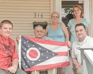 Not forgotten: During the Fourth of July weekend, Columbiana County Recorder Craig Brown met with local war veteran Jonas Murray. Murray is one of the area’s last Korean War veterans. He served in the 43rd Infantry and graduated from the Advanced Medical Leaders Academy. From left are Scott Vankirk, Murray’s grandson; Murray; his wife, Barbara; Elizabeth Horner, his stepdaughter; and Brown.