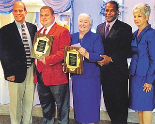 Ohio’s Grand Chapter and its officers of District 2 Order of the Eastern Star were honored recently by the Association of Chapters at Enzo’s in Warren. From left to right are Warren Mayor Michael O’Brien, Worthy Grand Patron Trevor Sproul, Worthy Grand Matron Sue Kerns, Mayor-elect Doug Franklin and hostess Holly Robinson, president of the association of chapters.