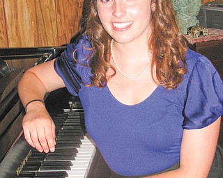 Eva Maria Laino, 19, who has earned numerous awards for her musical accomplishments, recently presented her senior piano recital in Canfield.