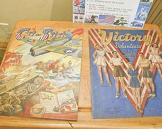 William d Lewis the Vindicator  Childrens cutout books from WWII on display at the Barnhisel House in Girard as part of military uniform exhibit.7-18-11.