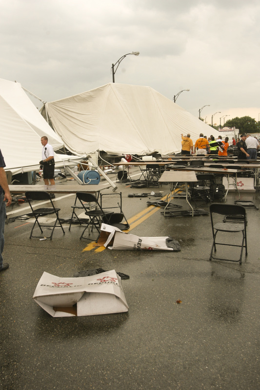 ROBERT K. YOSAY | THE VINDICATOR..A late afternoon summer thunderstorm hit the southside of Youngstown - taking down limbs, trees and knocking out electric -  the RIBFEST at the Covelli Centre had several people injured when tents were blown down ...-30-