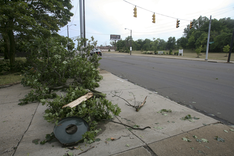 JESSICA M. KANALAS | THE VINDICATOR..Severe wind and rain caused damage to trees next to the Southside Academy on Market Street. Several street lights were also out of power causing many intersections to turn into four-way-stops...-30-