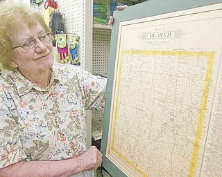 William D. Lewis the Vindicator Barbara Morey, local historian in Beaver Twp looks over an old township map. The township is about to observe its 200th anniv.