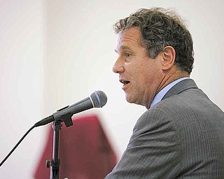 U.S. Sen. Sherrod Brown speaks to community members during Sunday’s town-hall meeting at the Union Baptist Church in Youngstown. The meeting discussed the impact of possible cuts to Social Security, Medicare and Medicaid.