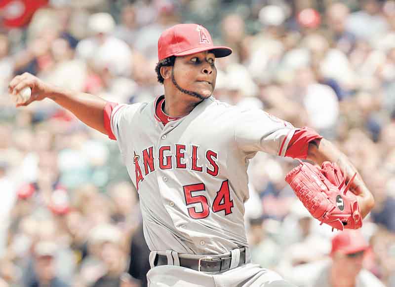 Los Angeles Angels' Ervin Santana pitches against the Cleveland Indians in the eighth inning of a baseball game Wednesday, July 27, 2011, in Cleveland. Santana tossed a no-hitter in the 3-1 win. (AP Photo/Mark Duncan)