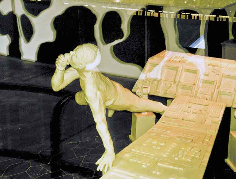 This undated photo provided by the American Dairy Association shows a butter sculpture display at the Ohio State Fair in Columbus, Ohio. The fair revealed on Tuesday, July 26, 2011, that the usual cow and calf made of butter are accompanied this time by a butter space shuttle and astronaut. (AP Photo/American Dairy Association)