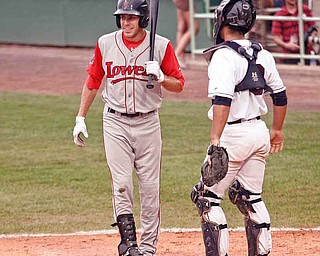 Lowell’s Drew Turocy looks for a sign from his third-base coach during Wednesday’s game. Tuorcy, a graduate of Canfield High, was drafted by the Boston Red Sox in June’s draft.