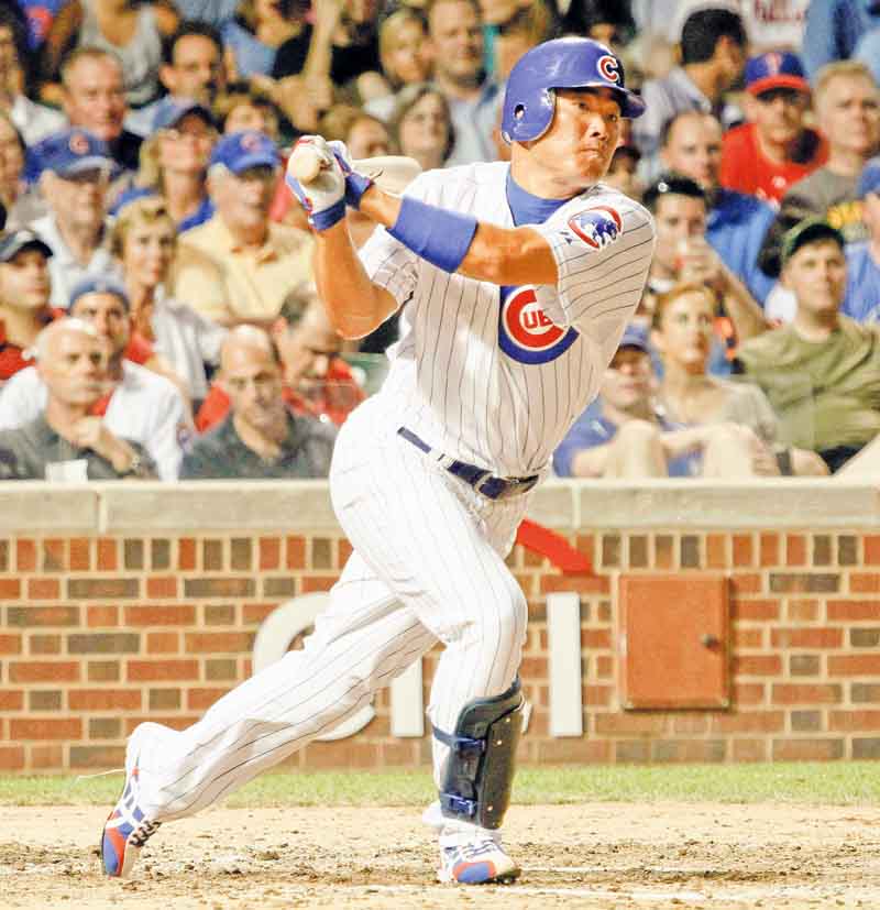 In this July 18, 2011 file photo, Chicago Cubs' Kosuke Fukudome hits an RBI double off Philadelphia Phillies relief pitcher Drew Carpenter during the sixth inning of a baseball game in Chicago. The Cleveland Indians have acquired Fukudome from the Cubs on Thursday, July 28, 2011.