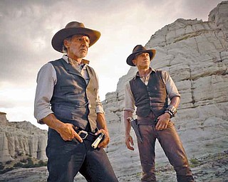 Harrison Ford and Daniel Craig star in the sci-western “Cowboys and Aliens.”