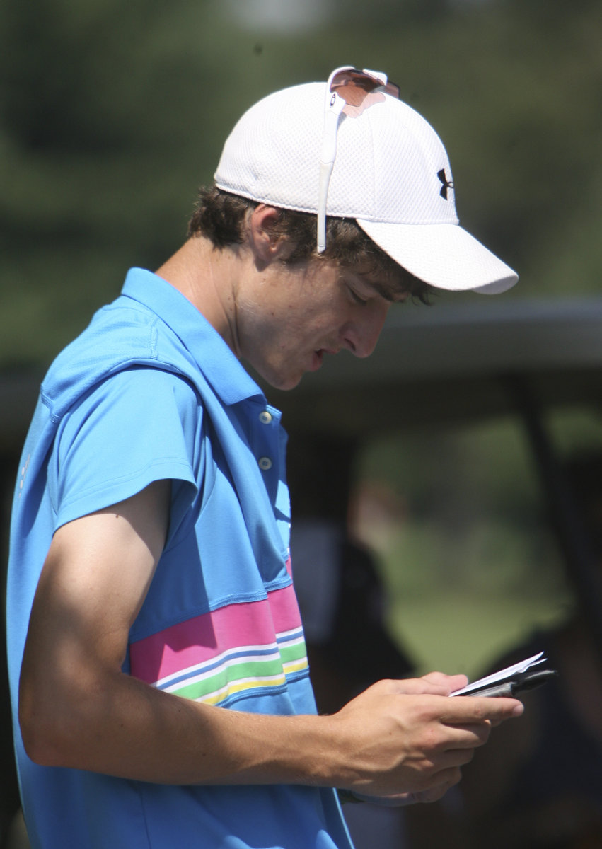 ROBERT  K.  YOSAY  | THE VINDICATOR --..Brandon Pluchinsky  checks his score as he enters the back nine - Brandon placed 3rd. -- The Vindicator Greatest Jr. Golfer of the Valley -at Trumbull Country Club in Warren -.--30-..(AP Photo/The Vindicator, Robert K. Yosay)