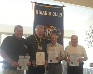 Members of the Western Mahoning County Kiwanis Club honored recently for membership and service were, from left, Bob Little (40-plus years), the Rev. Richard Fruit (50 years); Bob Thomas (40-plus years); and Wally Sinn (35 years). Also receiving honors for 35 years were Joseph Lane and Daniel Moss, not pictured.