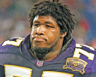 This Nov. 12, 2000, file photo shows Minnesota Vikings offensive tackle Korey Stringer leaves the field, in Minneapolis.  The Vikings have painted a big 77 on their practice field in Mankato to honor Stringer, the offensive tackle who died of heat stroke 10 years ago.