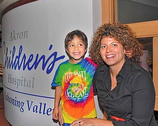 Gregory Carbon, almost 5, of Boardman, and his mother, Sharon Carbon, were on hand for the presentation of more than $1 million to Akron Children’s Hospital Mahoning Valley in Boardman from the Kikel Charitable Trust. Greg had his tonsils and adenoids removed in February at the hospital’s pediatric surgery unit, which was named The Kikel Center for Pediatric Surgery in honor of the gift. Mrs. Carbon said Tuesday her son received great treatment from start to finish.